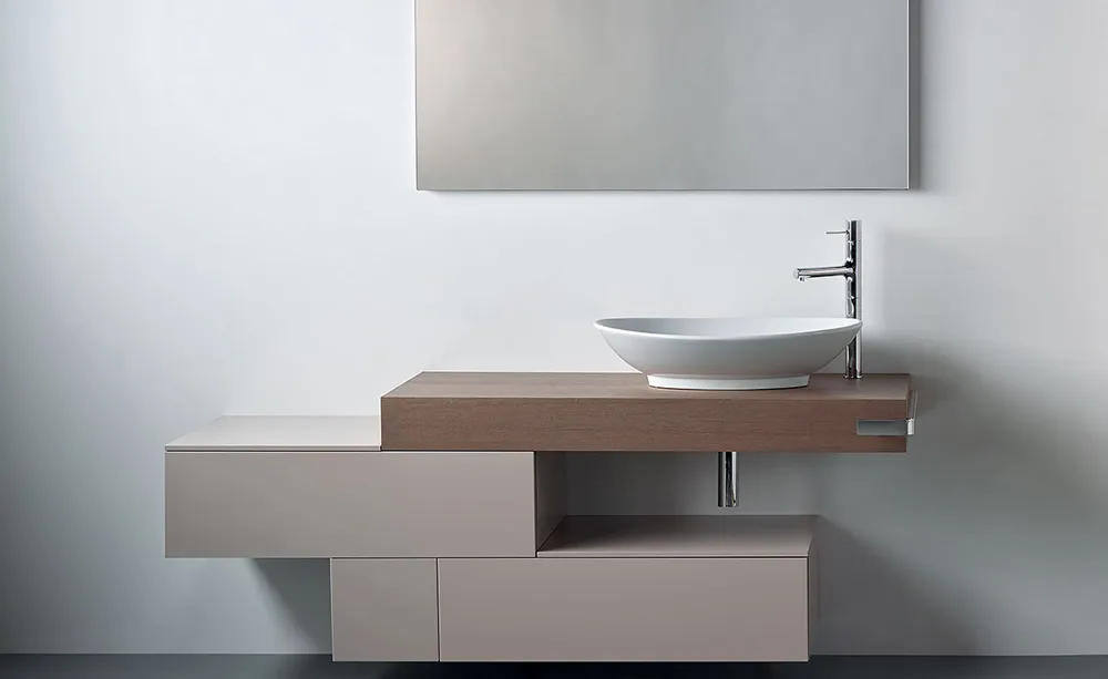 Vessel basin on a floating wooden vanity shelf